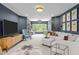 Comfortable living room featuring plush seating, ample natural light, and stylish decor at 814 Covered Bridge Trl, Chapel Hill, NC 27517