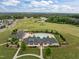 Beautiful community pool with clubhouse and expansive golf course views at 814 Covered Bridge Trl, Chapel Hill, NC 27517
