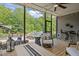 Serene screened-in porch overlooking the pool and patio, perfect for outdoor living and entertaining at 814 Covered Bridge Trl, Chapel Hill, NC 27517