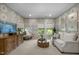 Cozy sitting area with natural light, patterned wallpaper, and stylish furnishings. A decorative spot to relax at 814 Covered Bridge Trl, Chapel Hill, NC 27517
