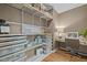 Storage room with custom shelves, desk, and hardwood floors at 814 Covered Bridge Trl, Chapel Hill, NC 27517