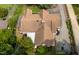 Aerial view of the home with a backyard pool, a basketball court and a spacious driveway at 821 Woodburn Rd, Raleigh, NC 27605