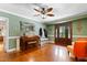 Elegant entryway featuring dark wood accents, decorative mirror, and vintage piano at 821 Woodburn Rd, Raleigh, NC 27605