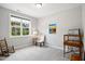 Cozy bedroom with neutral paint, natural light, and carpeted floors with window views at 8909 Tara Hill Ln, Wake Forest, NC 27587