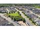 Aerial view of a Gathering-friendly neighborhood with playgrounds and green spaces at 1000 Groveview Wynd, Wendell, NC 27591