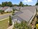 Aerial view of home showcasing its roof, two-car garage, and proximity to neighborhood amenities at 1000 Groveview Wynd, Wendell, NC 27591