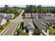 Aerial view showcasing the home's location in a quiet neighborhood with mature trees at 1000 Groveview Wynd, Wendell, NC 27591