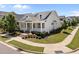 Inviting single-Gathering home with manicured landscaping, a covered front porch, and a well-kept lawn at 1000 Groveview Wynd, Wendell, NC 27591
