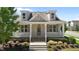 Beautiful home boasting a classic front porch, landscaped yard and private residence signage at 1000 Groveview Wynd, Wendell, NC 27591