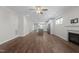 Spacious living room with open concept kitchen, recessed lights, and a fireplace at 1000 Groveview Wynd, Wendell, NC 27591