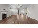 Living room has a fireplace and flows into multiple other rooms at 1000 Groveview Wynd, Wendell, NC 27591
