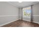 Home office with large window and luxury vinyl plank flooring at 1000 Groveview Wynd, Wendell, NC 27591
