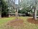 Charming single-story brick home with a well-maintained lawn and a welcoming covered porch at 1006 Aversboro Rd, Garner, NC 27529