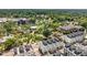Modern townhomes overlook a picturesque city park with green space and performance spaces at 1017 Frank Page Dr, Cary, NC 27511