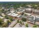 Aerial view of downtown buildings with shops, restaurants and offices, and ample parking at 1017 Frank Page Dr, Cary, NC 27511