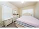 Bright bedroom with carpet flooring and white furniture at 1017 Frank Page Dr, Cary, NC 27511