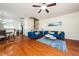 Open-concept living room featuring hardwood floors and comfortable seating at 1017 Frank Page Dr, Cary, NC 27511