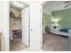 Walk-in closet with shelving, drawers, and storage space, accessible from bedroom at 1017 Frank Page Dr, Cary, NC 27511