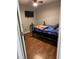 Modest bedroom with hardwood floors, window, and closet at 104 Holly Ranch Ct, Willow Springs, NC 27592
