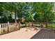 A spacious back deck overlooks the lush, tree-filled backyard, offering a private outdoor living space at 104 Shady Ridge Ct, Apex, NC 27502