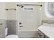 Bathroom showcasing a shower-tub, a toilet, and tile accents at 104 Shady Ridge Ct, Apex, NC 27502