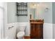 Charming bathroom with vintage vanity, toilet, and neutral color walls at 104 Shady Ridge Ct, Apex, NC 27502