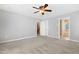 Expansive bedroom with plush carpet and several entryways at 104 Shady Ridge Ct, Apex, NC 27502