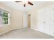 Cozy bedroom with plush carpet, natural light, and ample closet space at 104 Shady Ridge Ct, Apex, NC 27502
