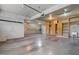 Spacious garage with built-in storage, sink, and brick trim at 104 Shady Ridge Ct, Apex, NC 27502
