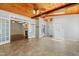 This is a view of the living room with a set of French doors leading to the sunroom at 104 Shady Ridge Ct, Apex, NC 27502