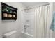 Bathroom featuring a white shower/tub combination and decorative wall shelves at 106 Choptank Ct # B-2, Cary, NC 27513