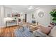 Bright living room featuring stylish furnishings, hardwood floors, and an open floor plan at 106 Choptank Ct # B-2, Cary, NC 27513