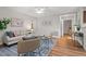 Stylish living room featuring hardwood floors, modern decor, and open-concept layout at 106 Choptank Ct # B-2, Cary, NC 27513