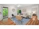 Comfortable living room featuring french doors to the patio, and minimalist decor at 106 Choptank Ct # B-2, Cary, NC 27513
