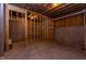 Unfinished basement with poured concrete foundation and exposed overhead supports at 112 Bellmont Crest Dr, Holly Springs, NC 27540