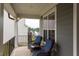 Cozy front porch featuring comfortable seating, perfect for relaxing and enjoying the outdoors at 112 Bellmont Crest Dr, Holly Springs, NC 27540