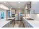 Bright kitchen featuring stainless steel appliances, a large island, and modern finishes at 112 Bellmont Crest Dr, Holly Springs, NC 27540