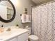 Cozy bathroom featuring white vanity, framed mirror, and neutral walls, offering a clean and fresh look at 114 Brenrose Cir, Durham, NC 27705