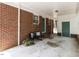 Covered carport with brick accents, providing convenient parking at 114 Brenrose Cir, Durham, NC 27705