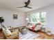 Cozy living room showcasing hardwood floors, stylish seating, and plenty of natural light at 114 Brenrose Cir, Durham, NC 27705