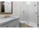 Bathroom features a marble countertop, modern fixtures, and a glass-enclosed walk-in shower at 115 Founders Ridge Dr, Chapel Hill, NC 27517