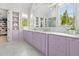 Bathroom has and sinks, marble countertops and floors, and a walk in shower at 115 Founders Ridge Dr, Chapel Hill, NC 27517