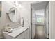 Bathroom with white vanity and marble countertop at 115 Heatherwood Dr, Apex, NC 27502