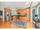 Spacious kitchen features stainless steel appliances, granite countertops, and ample cabinet space at 1230 Golden Bluff Ln, Fuquay Varina, NC 27526