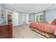 A view of the main bedroom showing an ensuite bathroom and a sitting area at 1230 Golden Bluff Ln, Fuquay Varina, NC 27526