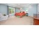 Spacious main bedroom with a ceiling fan, large window, and sitting area at 1230 Golden Bluff Ln, Fuquay Varina, NC 27526