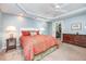 A spacious main bedroom features a walk-in closet and elegant decor at 1230 Golden Bluff Ln, Fuquay Varina, NC 27526