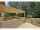 Outdoor wooden deck and latticed pergola at 1308 Swallow Dr, Raleigh, NC 27606