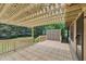 Outdoor wooden deck and latticed pergola at 1308 Swallow Dr, Raleigh, NC 27606