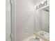 Bathroom featuring single vanity and lighting fixture above the large mirror at 1308 Swallow Dr, Raleigh, NC 27606